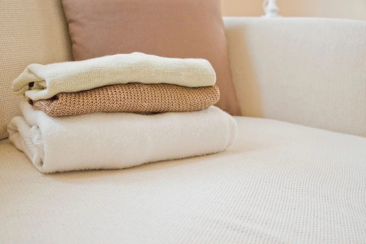 Cotton and wool throws compared for year-round use